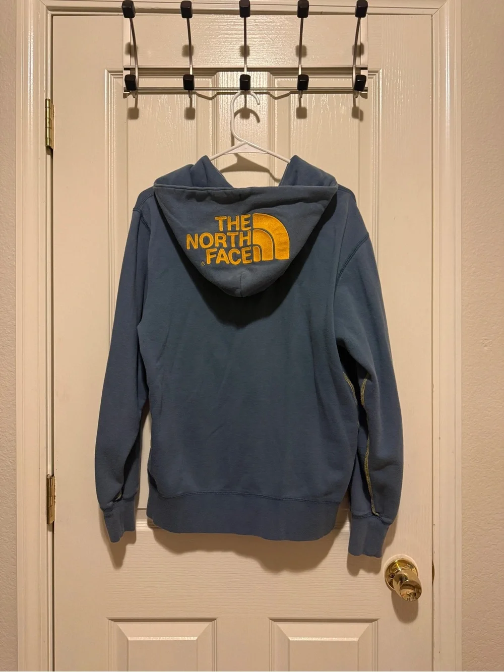 The North Face Kids Blue Zip Hoodie with Yellow Trim
